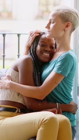 two women sharing an affectionate embrace