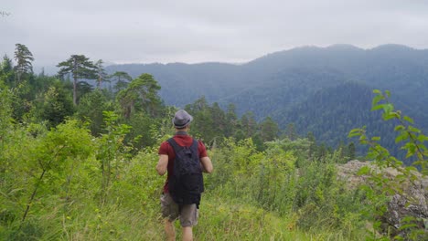 Tourist-walking-on-the-summit.-Free-and-happy.