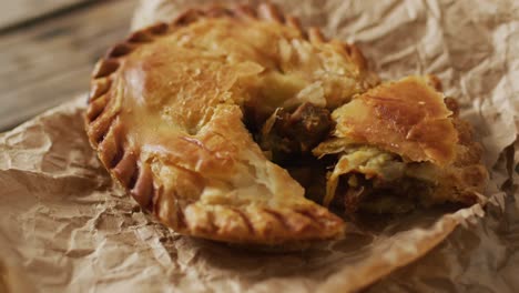 video of pie seen from above on wooden background