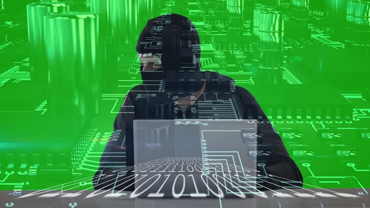 Hacker bruger bærbar computer over binær kode mod kredsløb af forbindelser