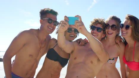 friends taking a selfie on the beach