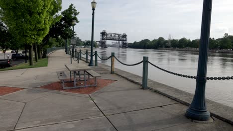 riverfront of des plaines river in downtown joliet, illinois with gimbal video walking forward