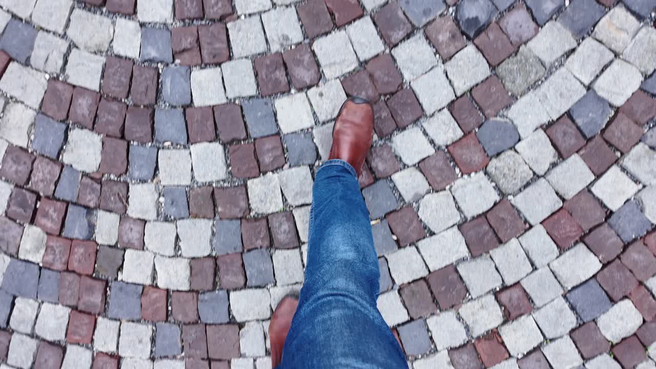 Footwear on cobblestone street