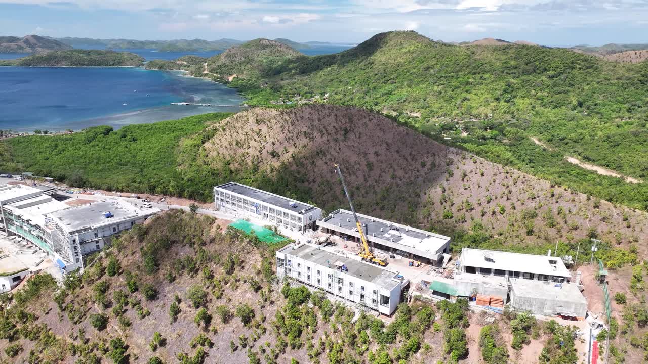 Above View Of Ongoing Construction Building Over Mountains In Busuanga, Palawan, Philippines. Aerial Drone Shot