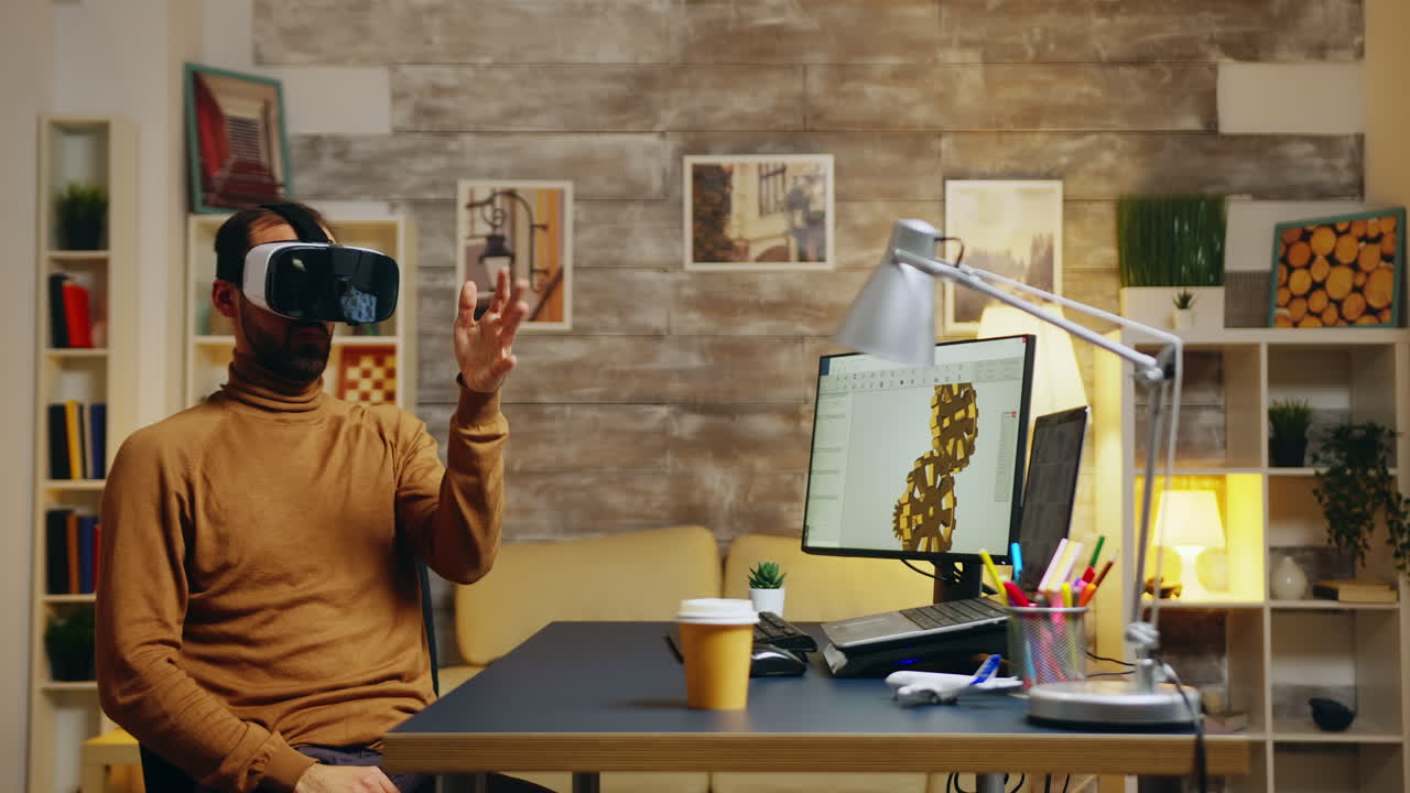 Male engineer working in his home office on a new technology