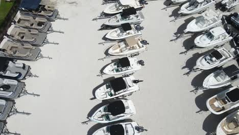 slow aerial journey down a boat sales lot