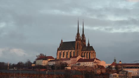 morning sun shining on old church in brno city