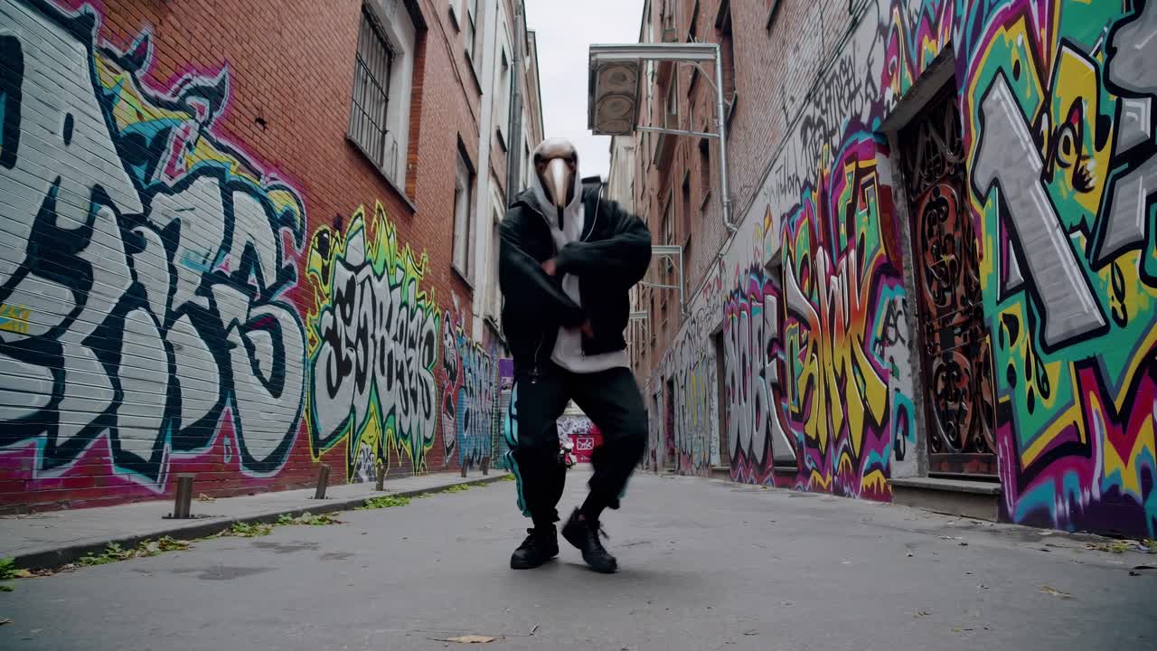 Dynamic street dancer showcases energetic moves in vibrant alleyway, surrounded by colorful graffiti, capturing the essence of urban dance culture