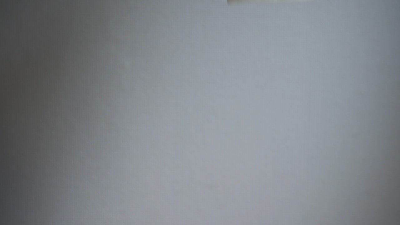 Shot of bank notes dropping in a white