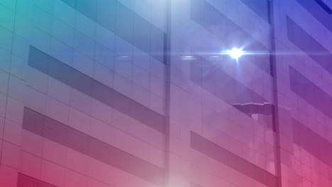 animación de una luz de punto brillante flotando sobre un edificio de oficinas con un tinte azul a rosa