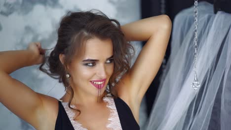 beautiful woman is relaxing on floor. beautiful woman in black underwear is relaxing on floor