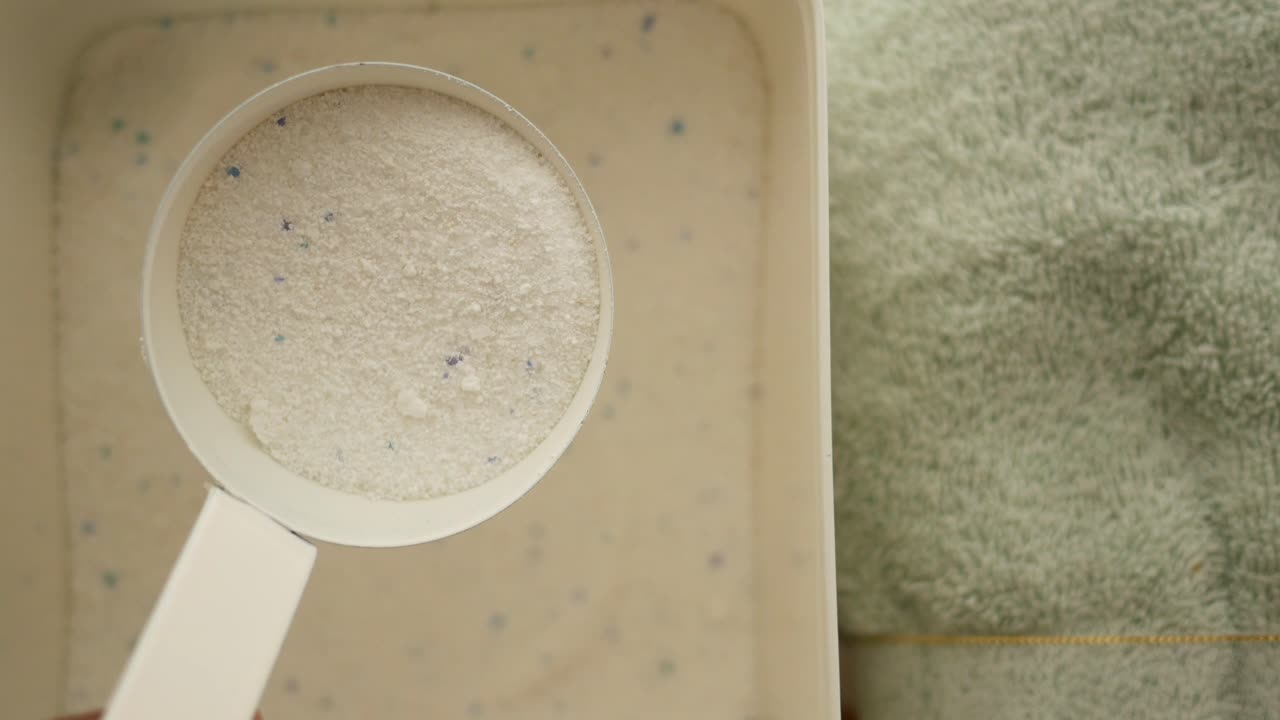Laundry Detergent in Measuring Cup