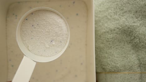laundry detergent in measuring cup
