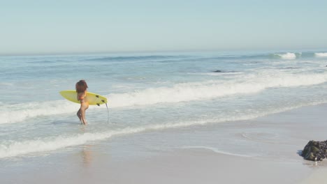 African-American-woman-ready-to-go-surf