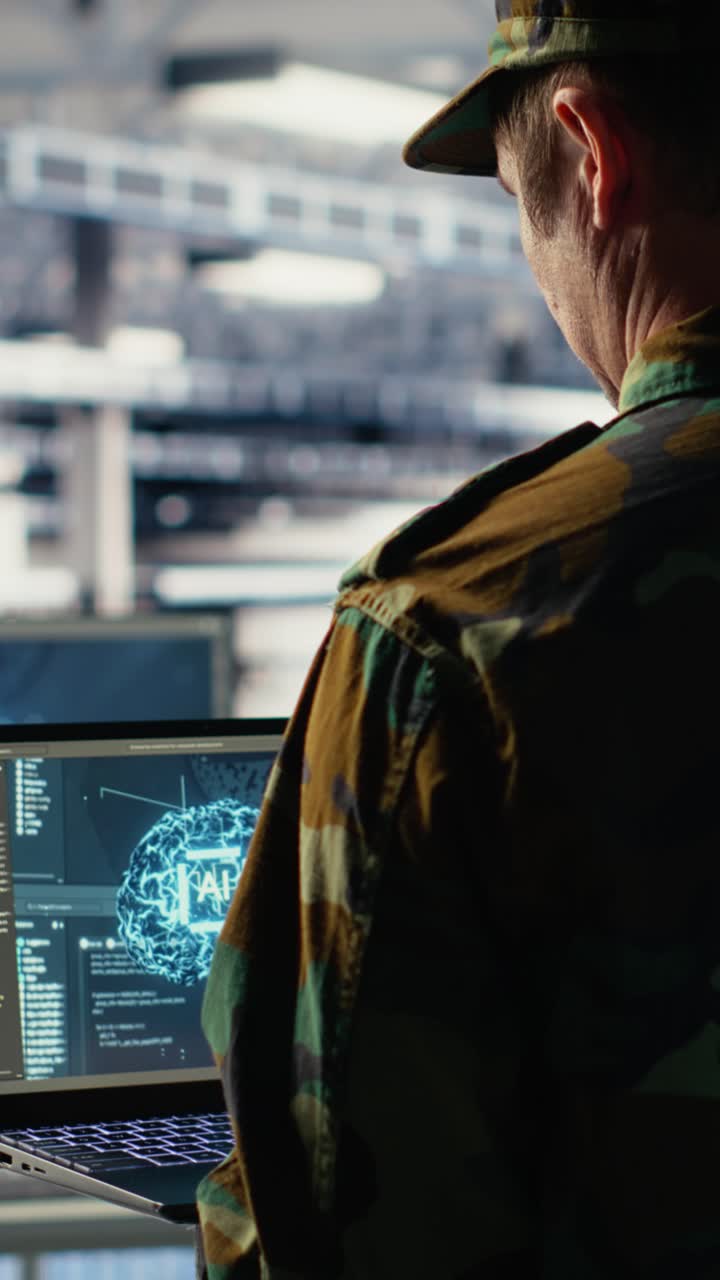 Vertical Video Army Programmer In High Tech Server Hub Uses Ai Application On Laptop