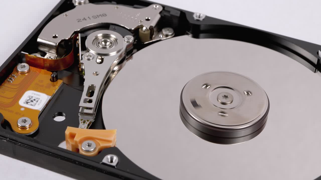 Hard Disk Drive Inside. Structure of HDD, Spinning Platter. Move magnetic head