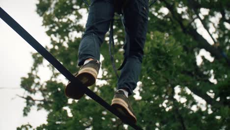 man walking on the rope and falling