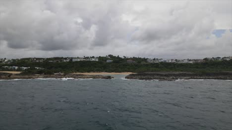 Bay-of-Atlantic-Ocean-in-tropical-resort-under-clouds