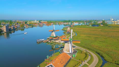 beautiful aerial drone footage of still windmills in zaanse schans, netherlands