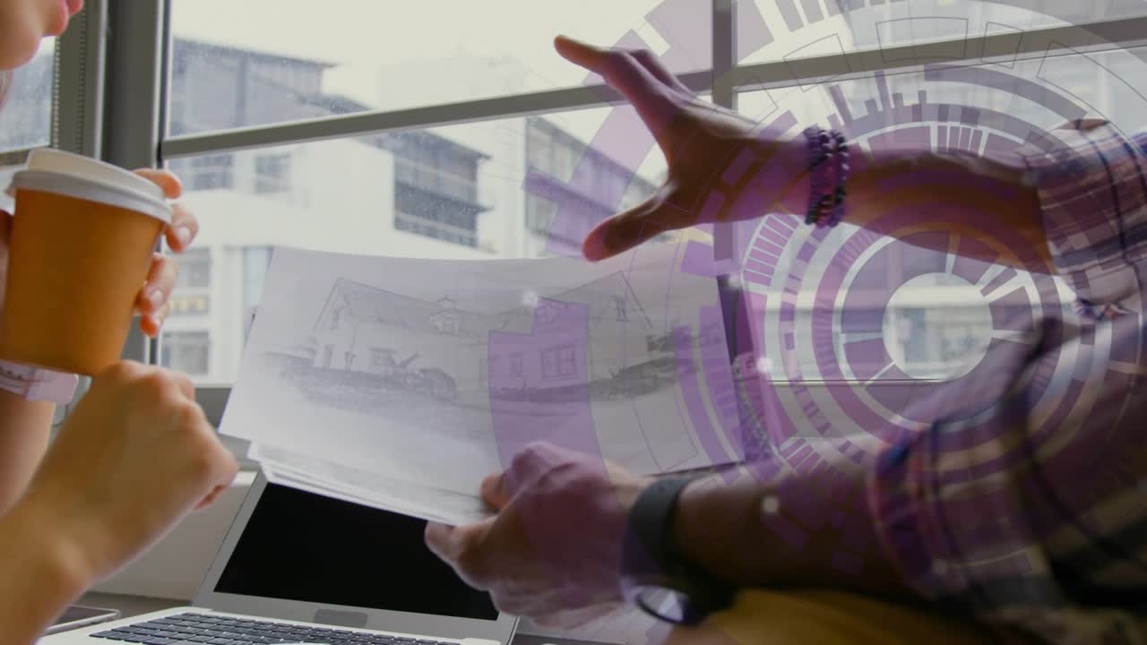 Woman pointing at printed plans and causing purple HUD while colleague gesturing for design review