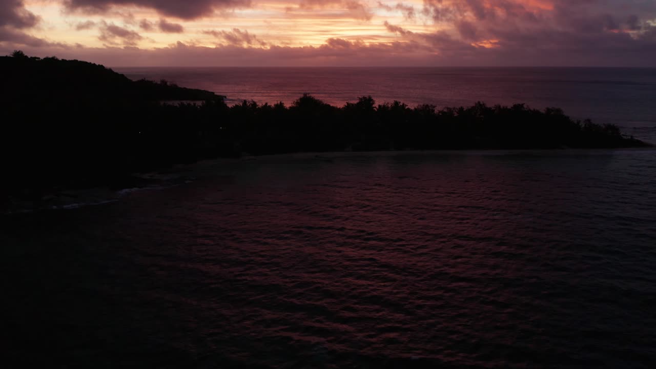 The beautiful red sunset sky over the Fiji Islands - aerial