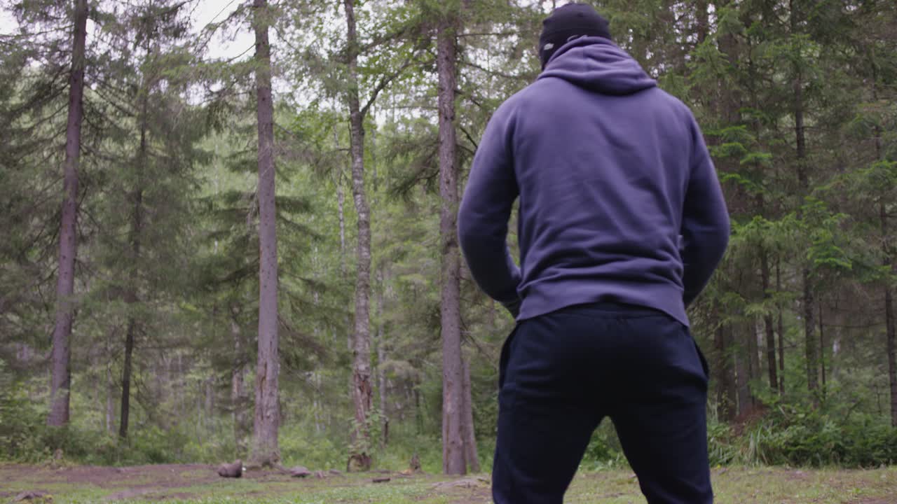 Man exercising in the forest