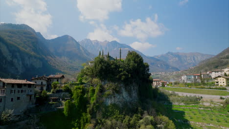 mound or mountain with a construction in trentino alto adige lombardia city