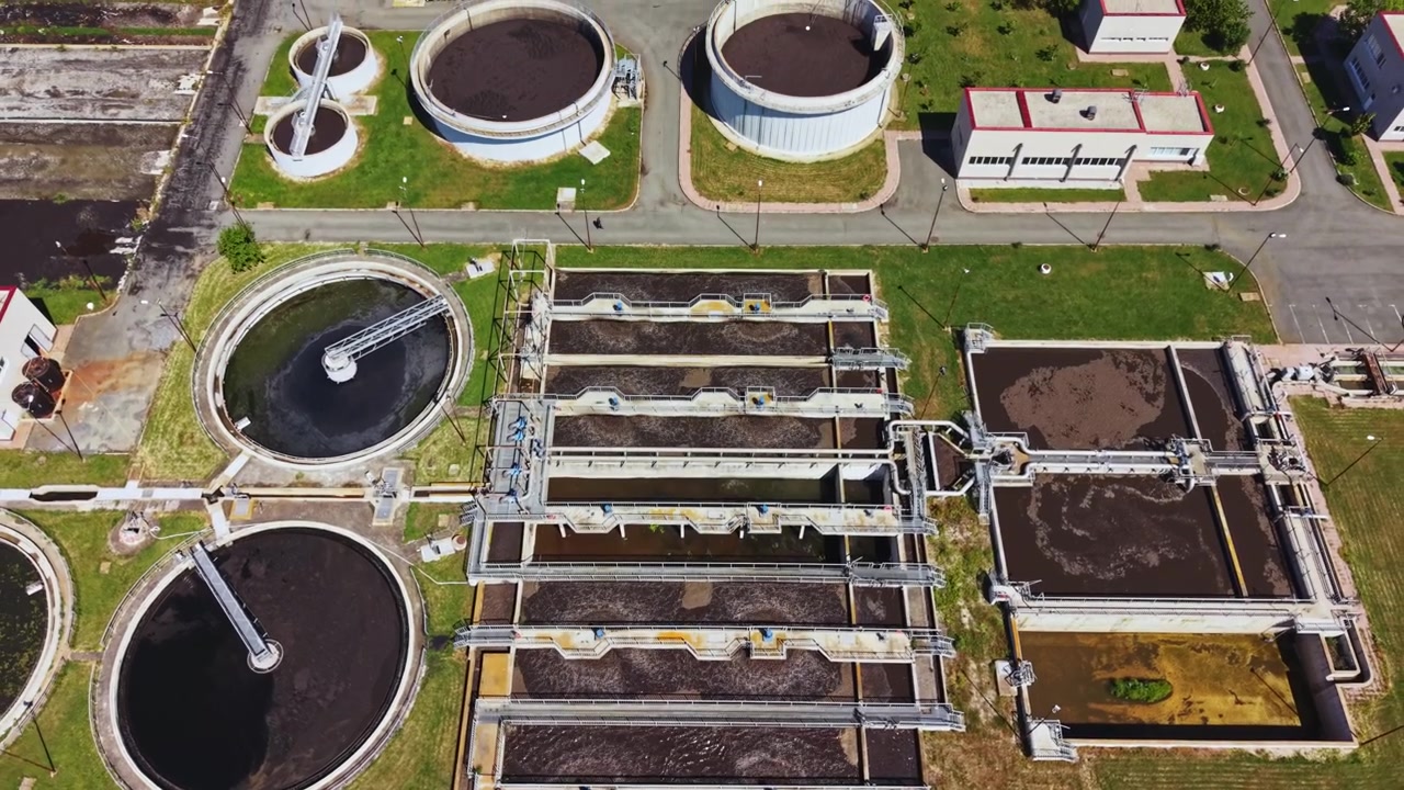 Comprehensive view of wastewater processing infrastructure. Detailed aerial perspective highlighting integrated design of wastewater treatment and storage structures