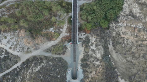 Top-down-view-of-empty-train-tracks-in-Soledad,-California