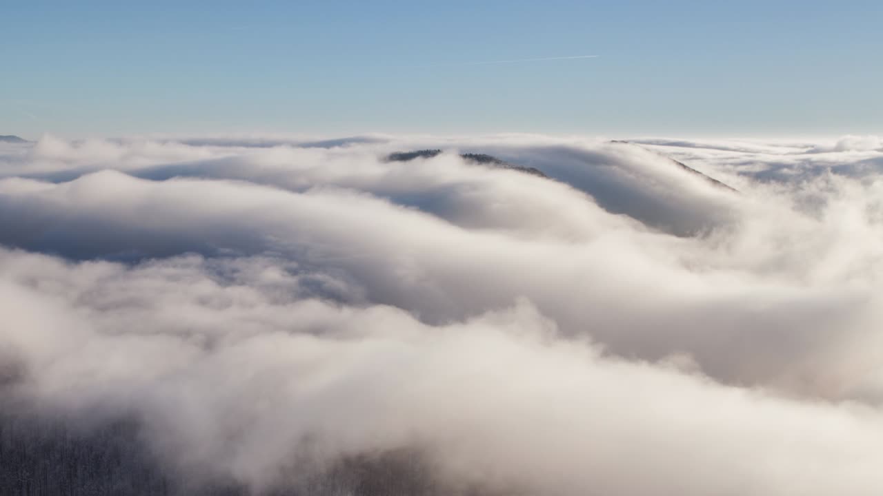 Time lapse of clouds over mountain landscape