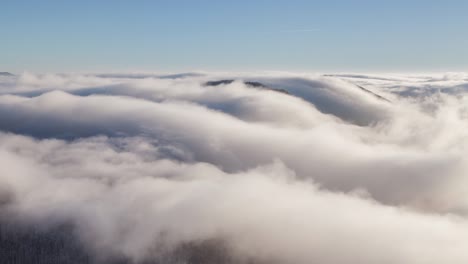 time lapse of clouds over mountain landscape