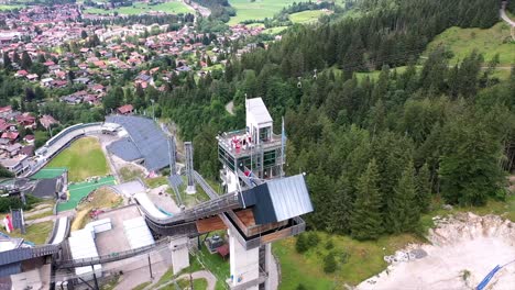 nice drone orbit flight around a ski jump in germany