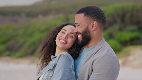 happy, love and couple hug on beach at sunset