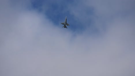 fa 18 fighter plane flies high towards the sky at the air show called airpower
