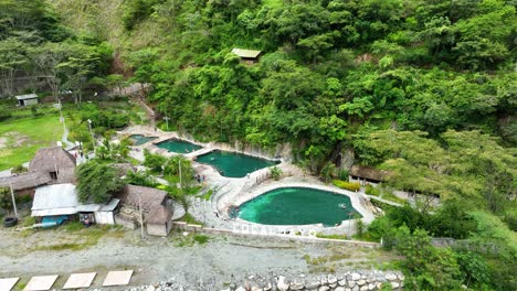 aerial fly drone view of hot spring cocalmayo, santa teresa, peru, andes, south america