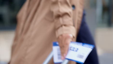 closeup, hand and woman with a ticket