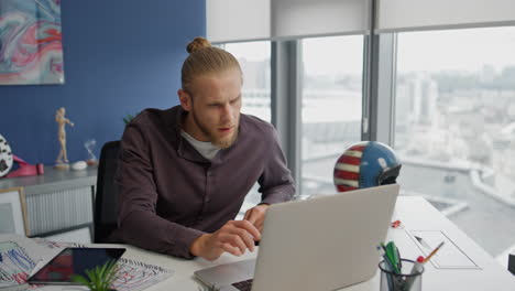 confident businessman speaking video call computer at home. man calling laptop