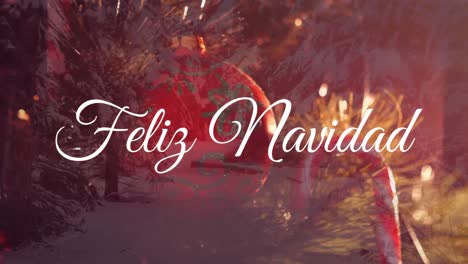 Animation-Von-Feliz-Navidad-Text-über-Weihnachtsdekorationen