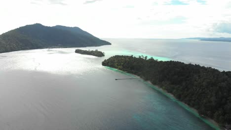 A-stunning-tropical-Raja-Ampat-archipelago,-Indonesia-with-lush-green-islands-surrounded-by-turquoise-waters