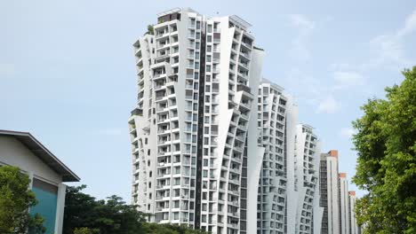 low angle view of signapore residential buildings against blue sky ,