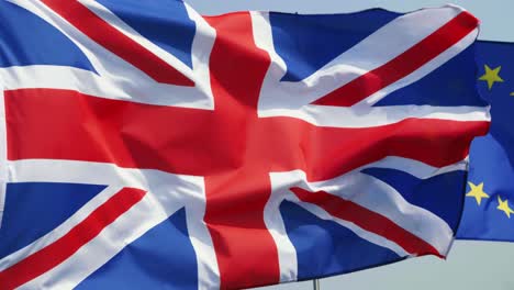 Blue-sky-and-two-different-flags