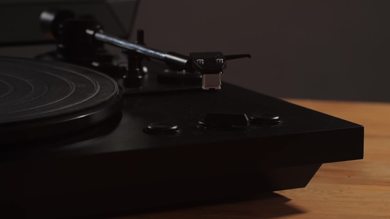 Retro Vinyl records in man hands close-up macro. Old disck for music. Retro vintage music player at home