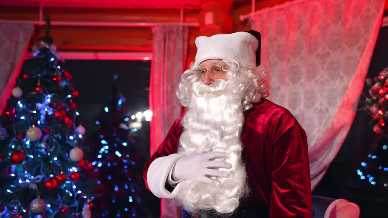 Santa Claus with kids at home. New Year eve with Santa in the room with the Christmas decorations