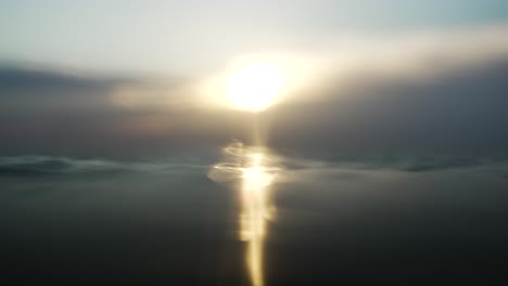 Floating-on-dark-gloomy-water-surface-facing-sunset-glow