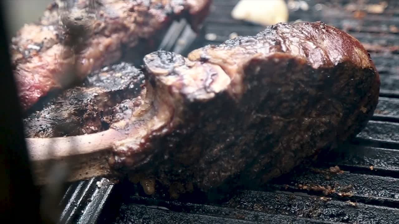 Tomahawk steak on grill