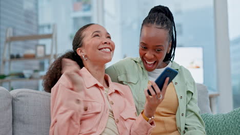 women friends, phone and home with winning