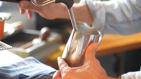 barista preparing a coffee beverage