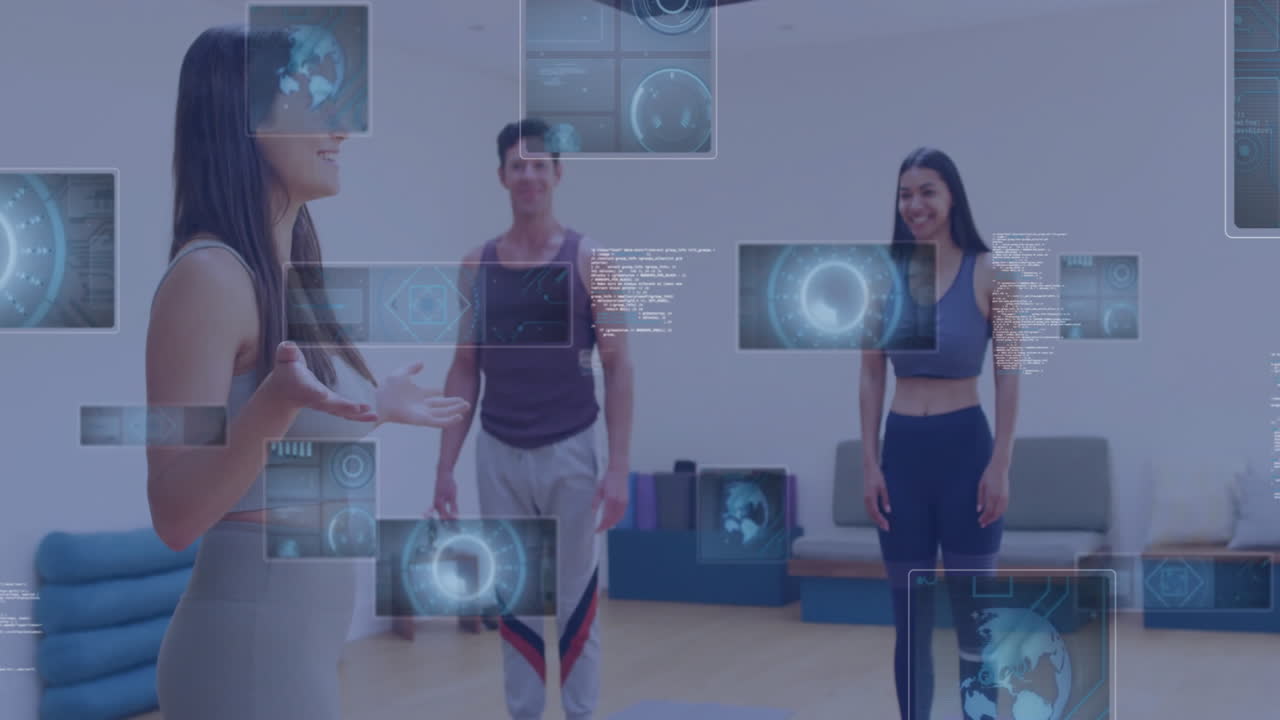 Instructor guiding students in fitness studio showing floating holographic panels over yoga mats
