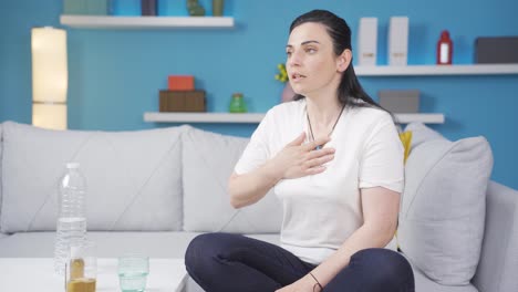 sick woman with rapid breathing. the woman cannot control her breathing.