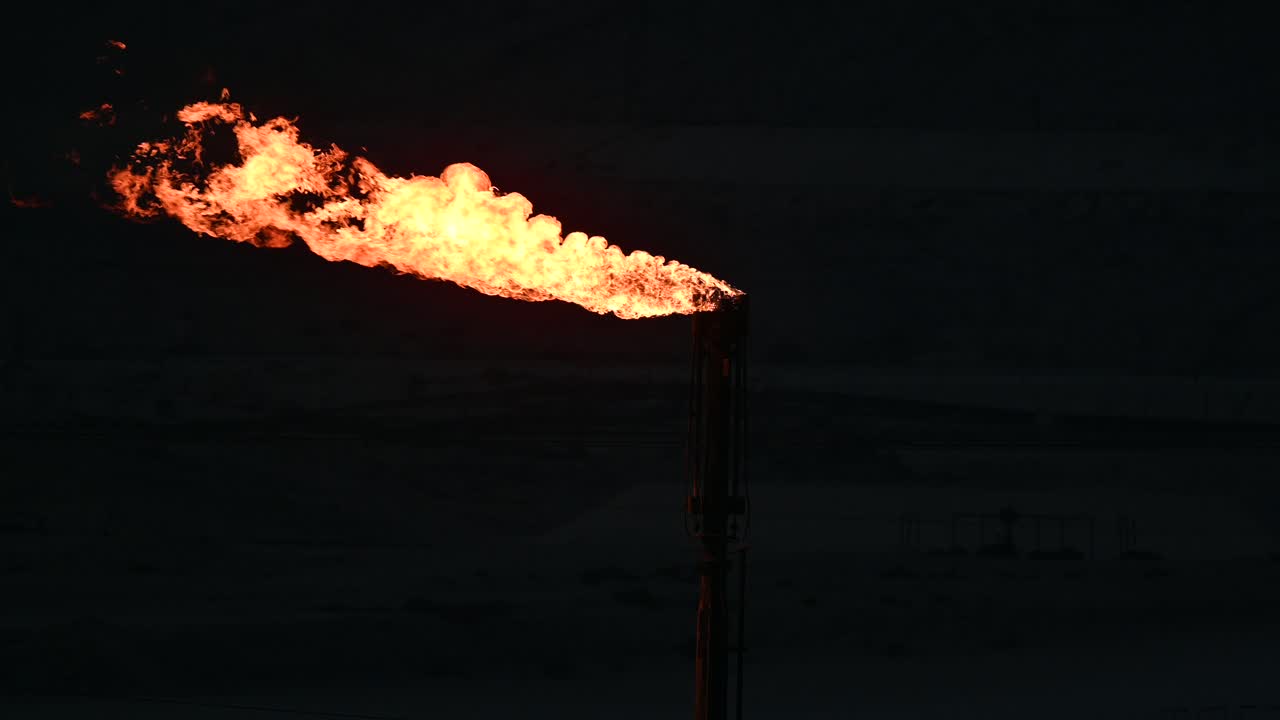 Gas Flare Burning at Night